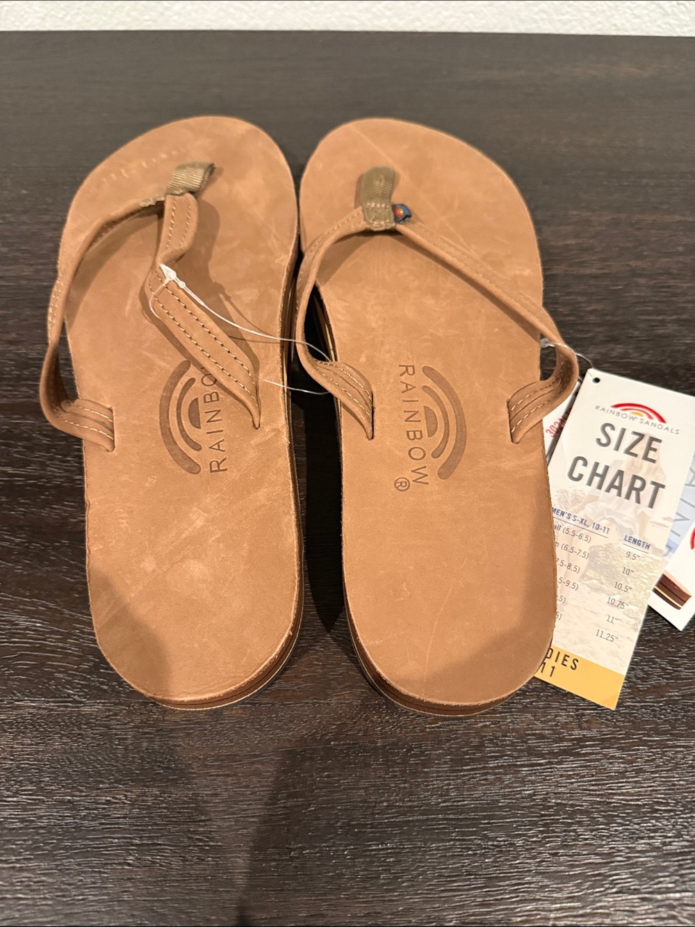 NWT Rainbow women’s size 11 Tan Leather-Style Flip Flops